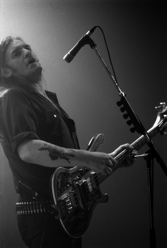 The Tragically Hip performing under stage lights